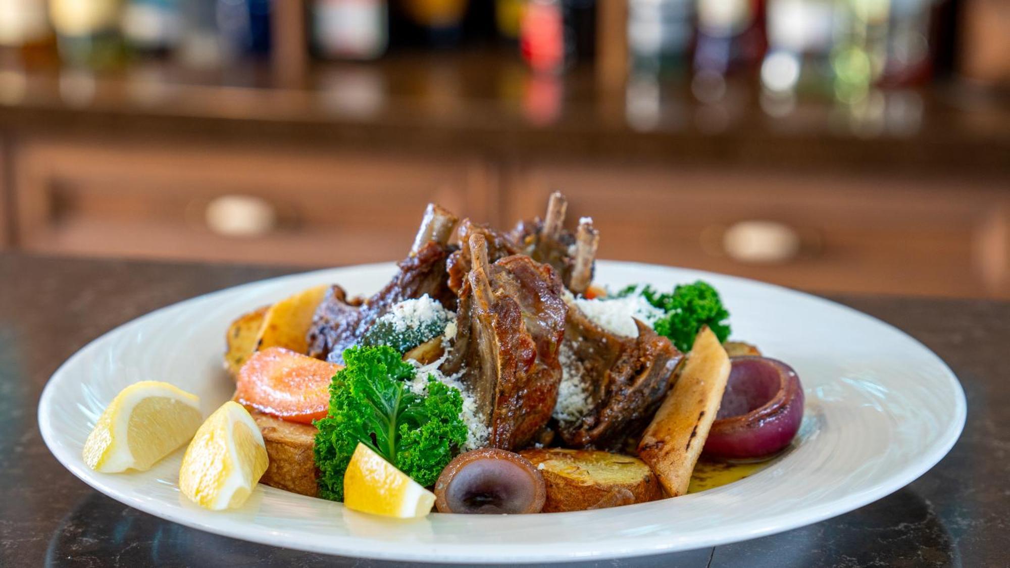 Boutique Odyseja & Spa Ciechocinek Ngoại thất bức ảnh A plate of grilled lamb chops