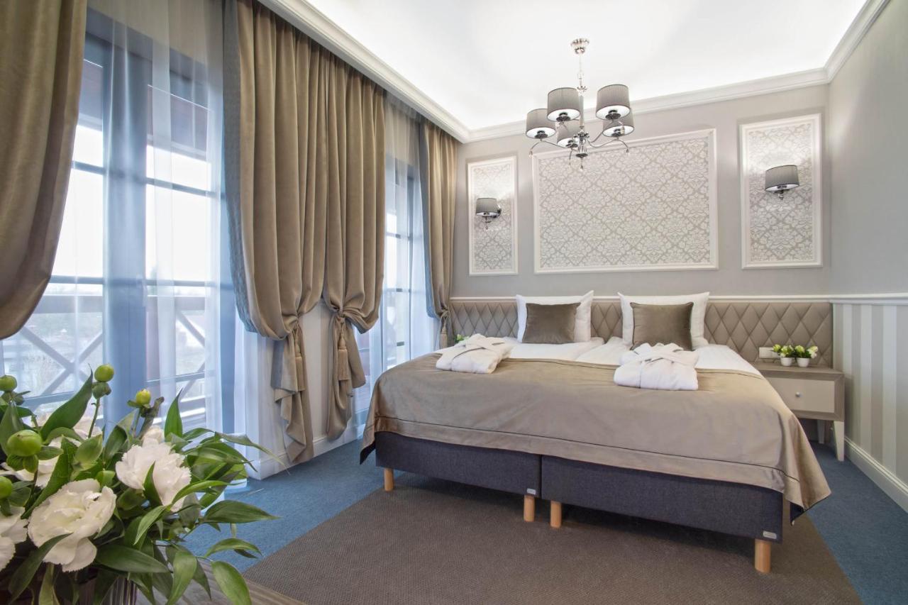 Boutique Odyseja & Spa Ciechocinek Ngoại thất bức ảnh A bedroom in the hotel