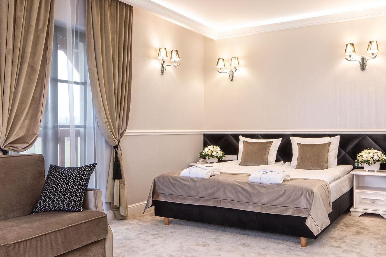 Boutique Odyseja & Spa Ciechocinek Ngoại thất bức ảnh A bedroom at the hotel