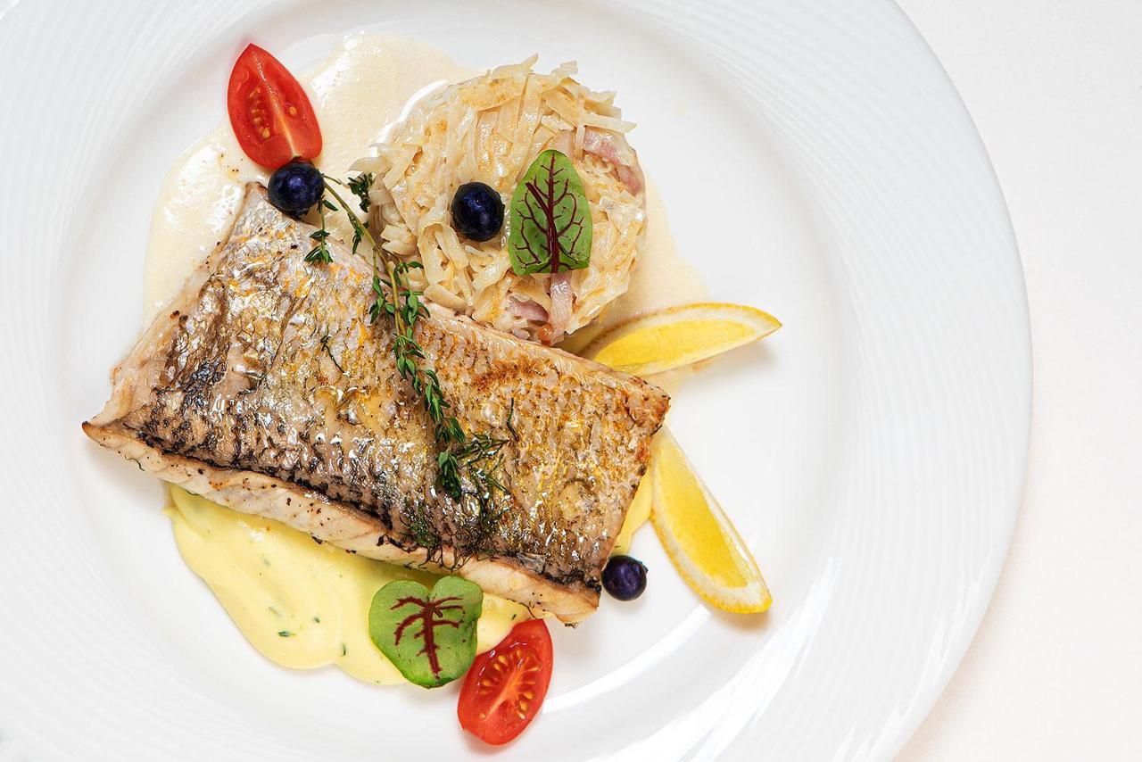 Boutique Odyseja & Spa Ciechocinek Ngoại thất bức ảnh A prepared dish of Arctic char